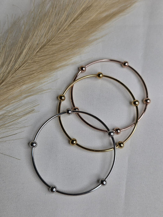 Trio pulseras de 3 tonos